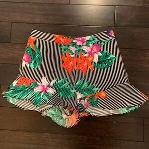 Floral and striped shorts.